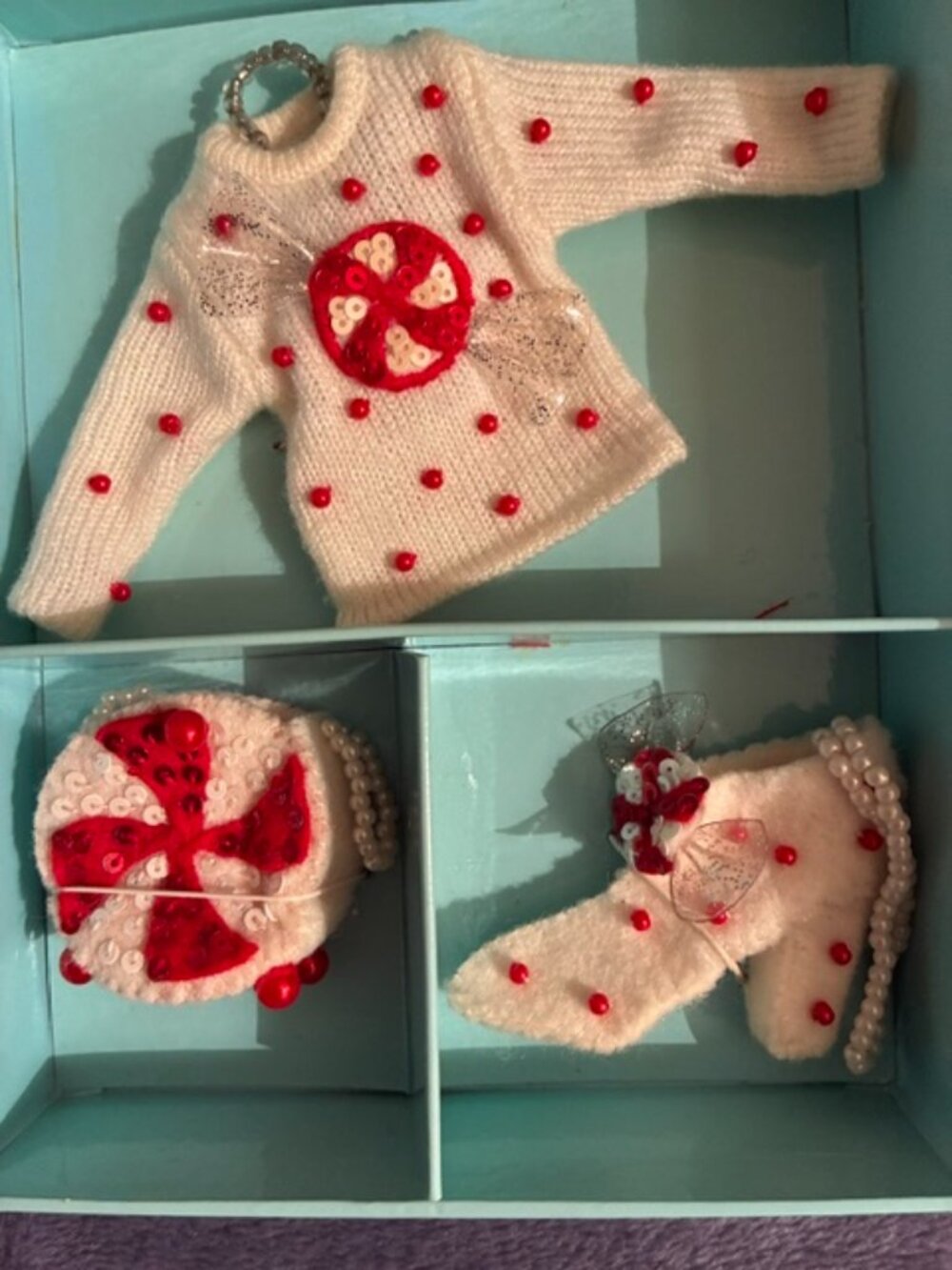 Set of mini shopper girl sweater ornaments